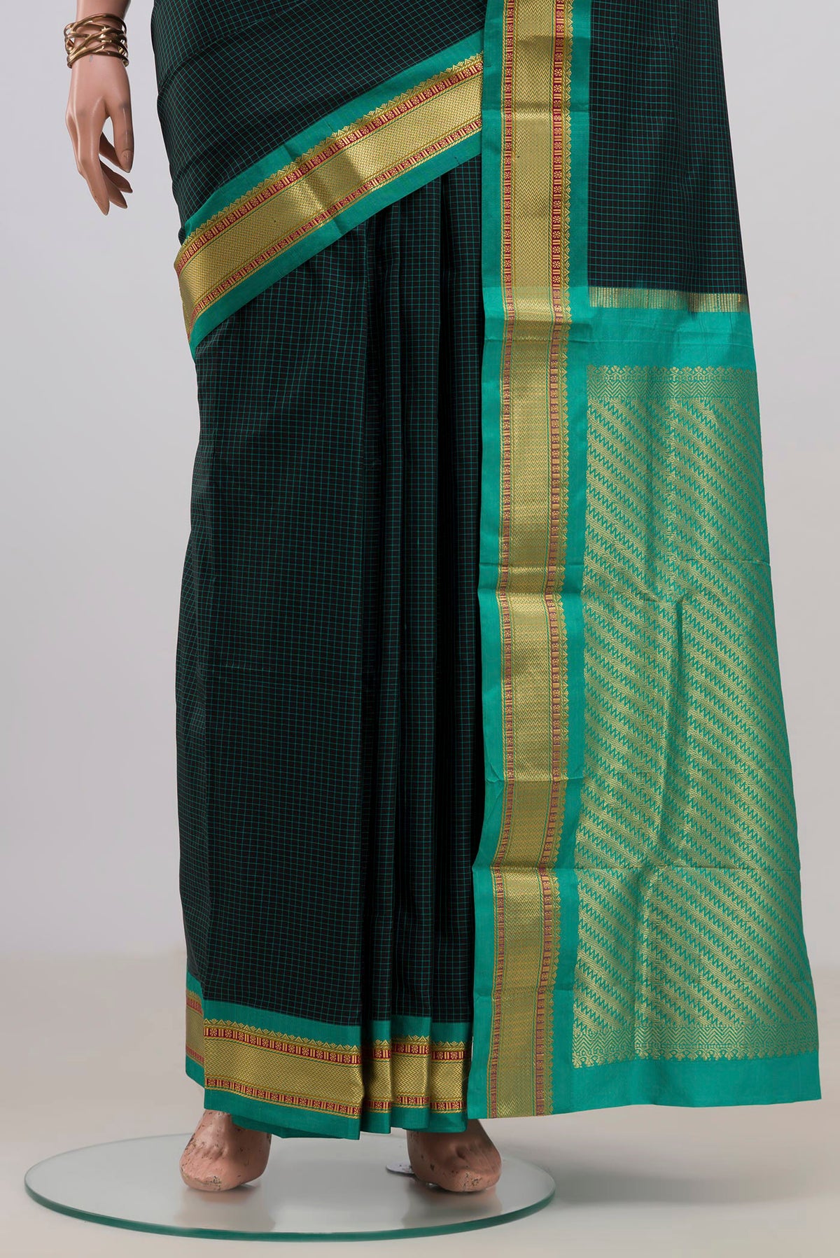 Pleats and pallu of Pure Silk Black Narayanpet Saree with Checked design on the body and Zari Border. 