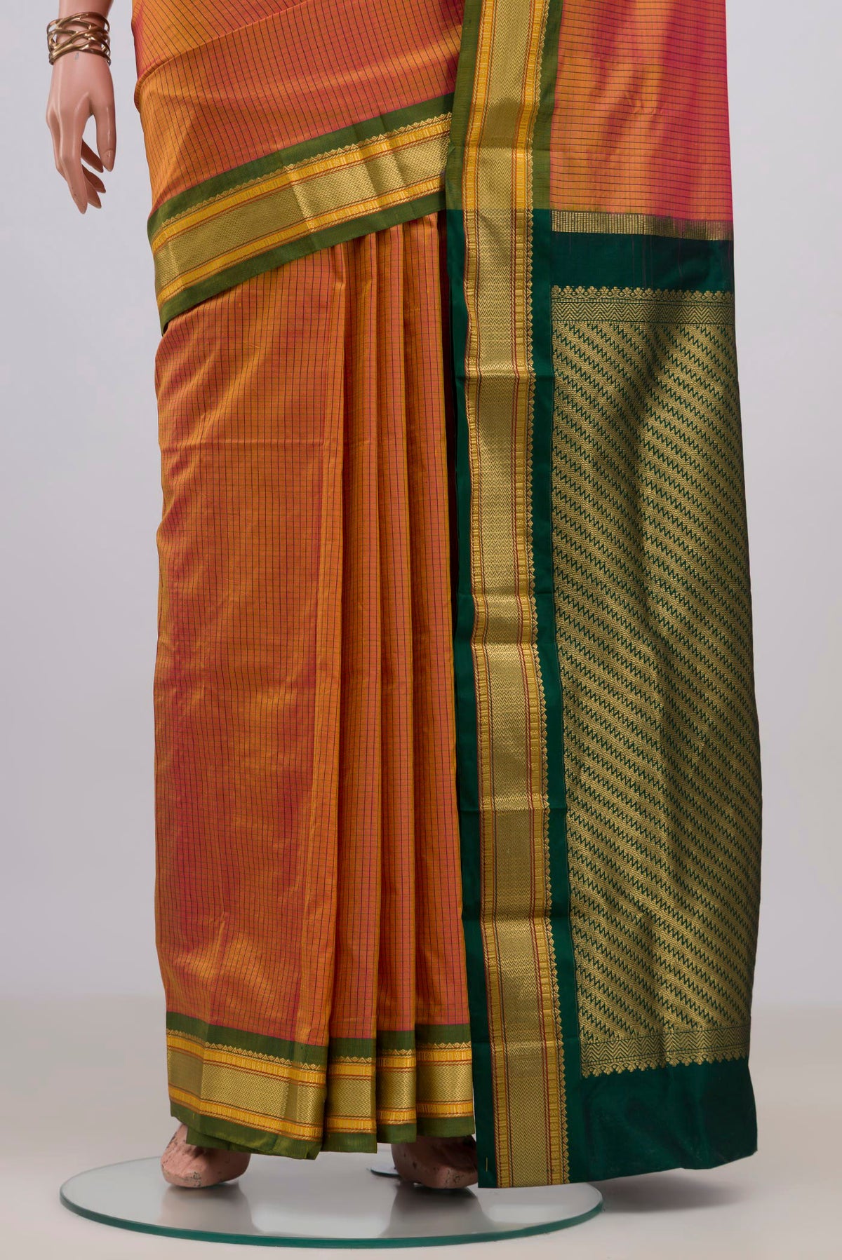 Pleats and pallu of Pure Silk Yellow Narayanpet Saree with Checked design on the body and Zari Border. 