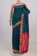 Pure Silk Blue Narayanpet Saree with Checked design on the body and Zari Border.  displayed on a mannequin