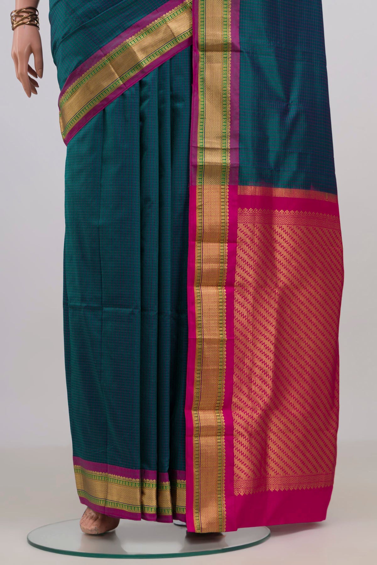 Pleats and pallu of Pure Silk Blue Narayanpet Saree with Checked design on the body and Zari Border. 