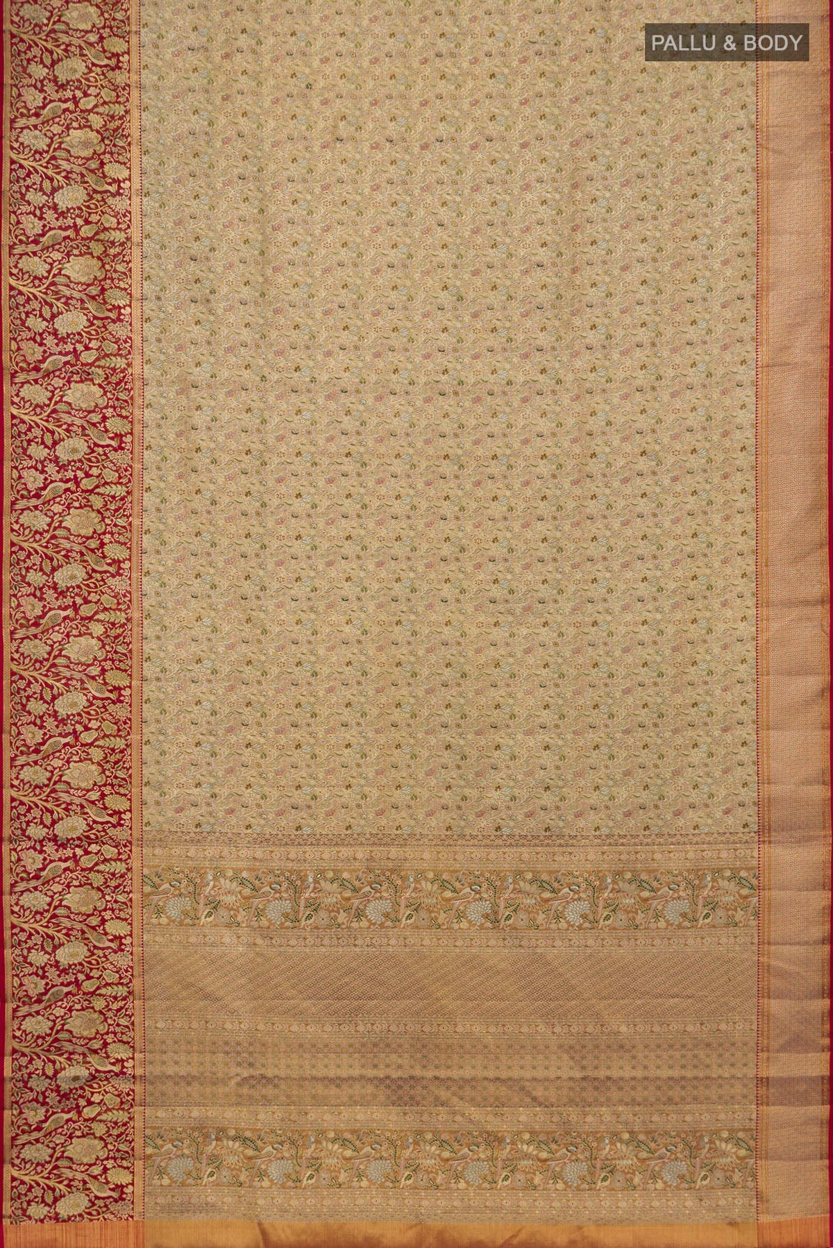 Flat view of Gold Kanchipuram Tissue Saree with Zari Brocade on the body and Zari Border. 