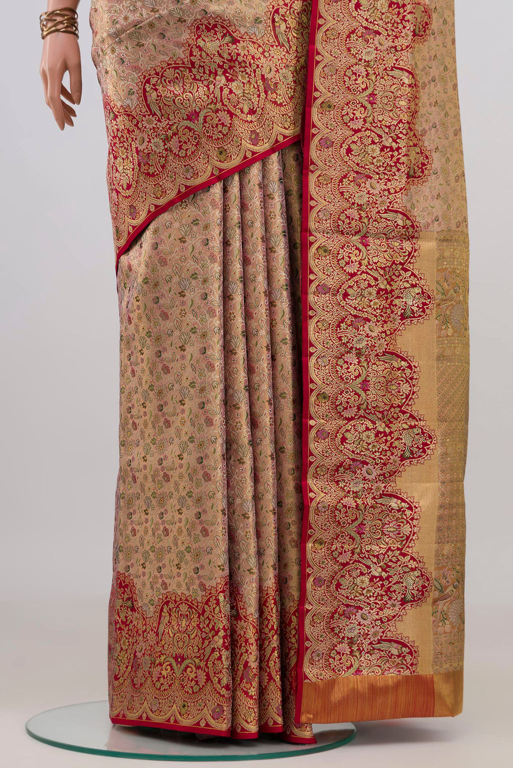 Pleats and pallu of Golden Peach Kanchipuram Tissue Saree with Zari Brocade on the body and Fancy Border. 
