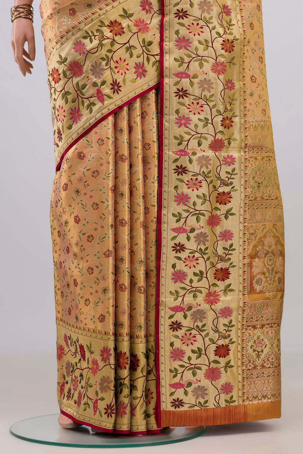 Pleats and pallu of Peach Dual Tone Kanchipuram Tissue Saree with Zari Brocade on the body and Fancy Border. 