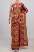 Red Kanchipuram Saree with Zari Brocade on the body and Fancy Border.  displayed on a mannequin