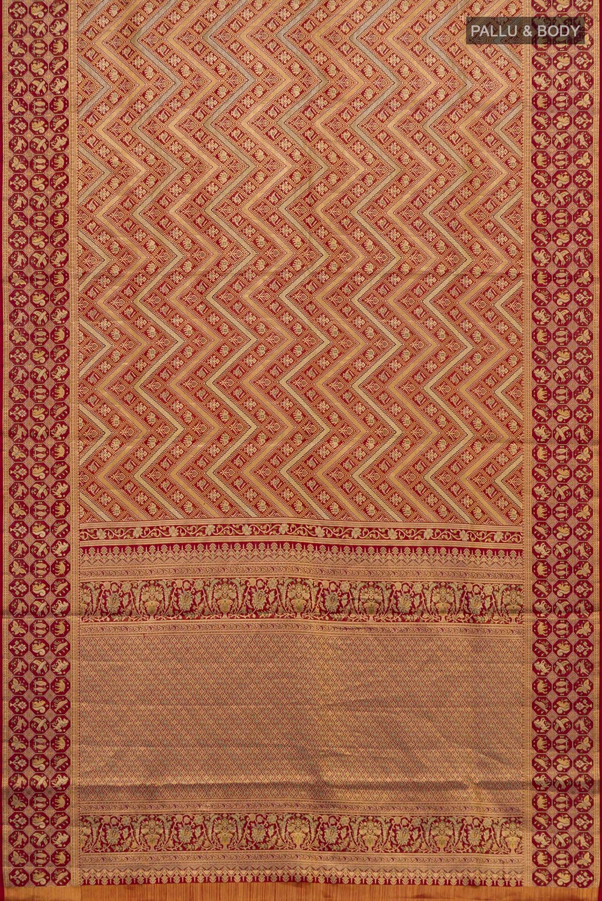 Flat view of Red Kanchipuram Saree with Zari Brocade on the body and Fancy Border. 