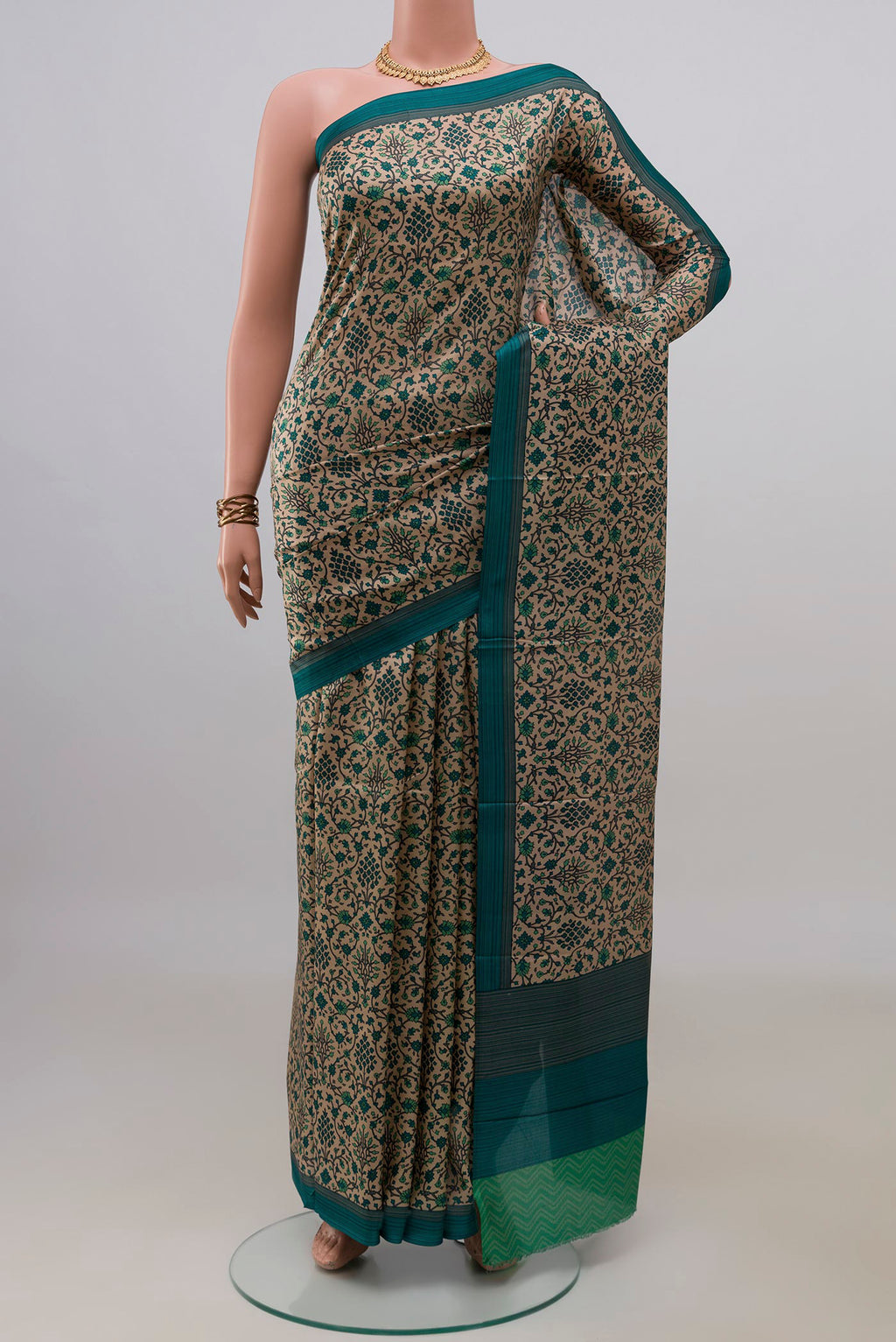 Pure Silk Beige Printed Saree with Printed design on the body and Plain Border.  displayed on a mannequin