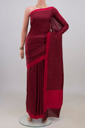 Pure Silk Maroon Printed Saree with Printed design on the body and Plain Border.  displayed on a mannequin