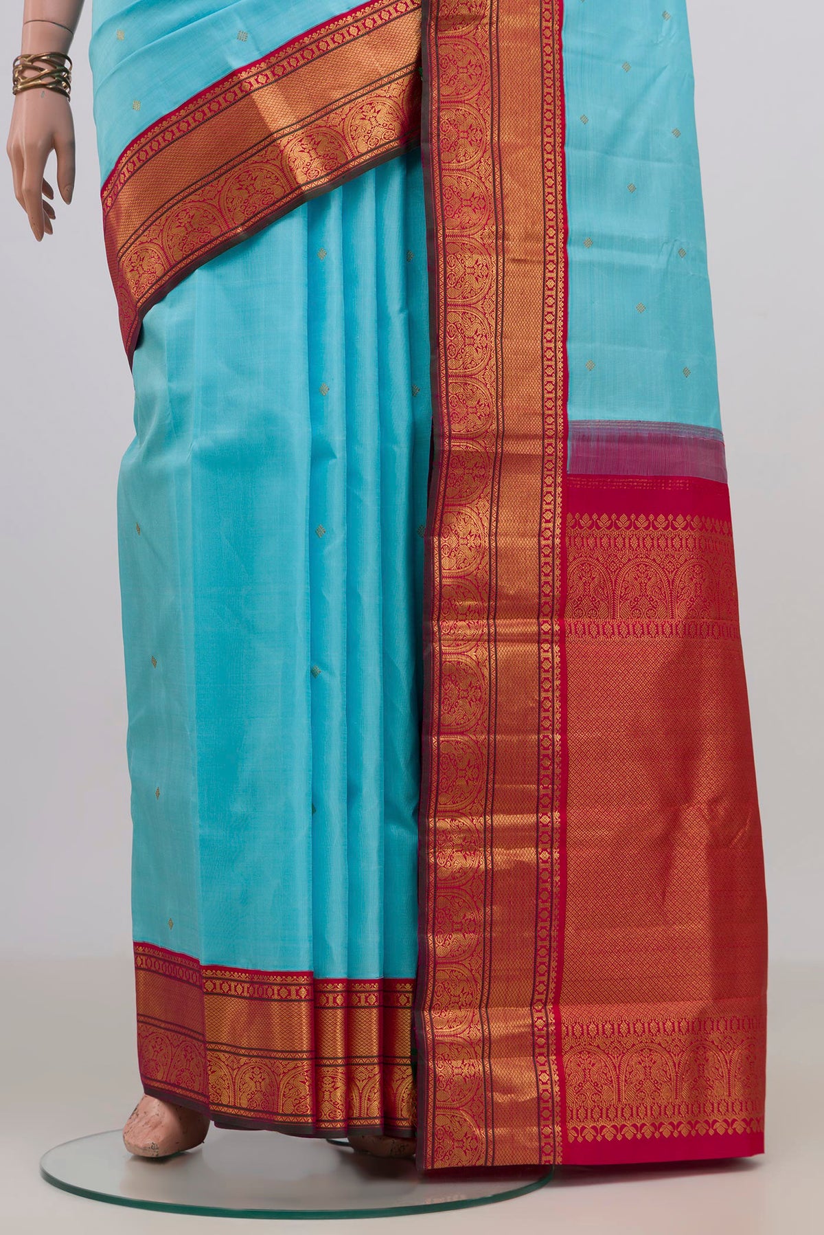 Pleats and pallu of Pure Silk Light Blue Kanjivaram Saree with Zari Butta on the body and Zari Border. 