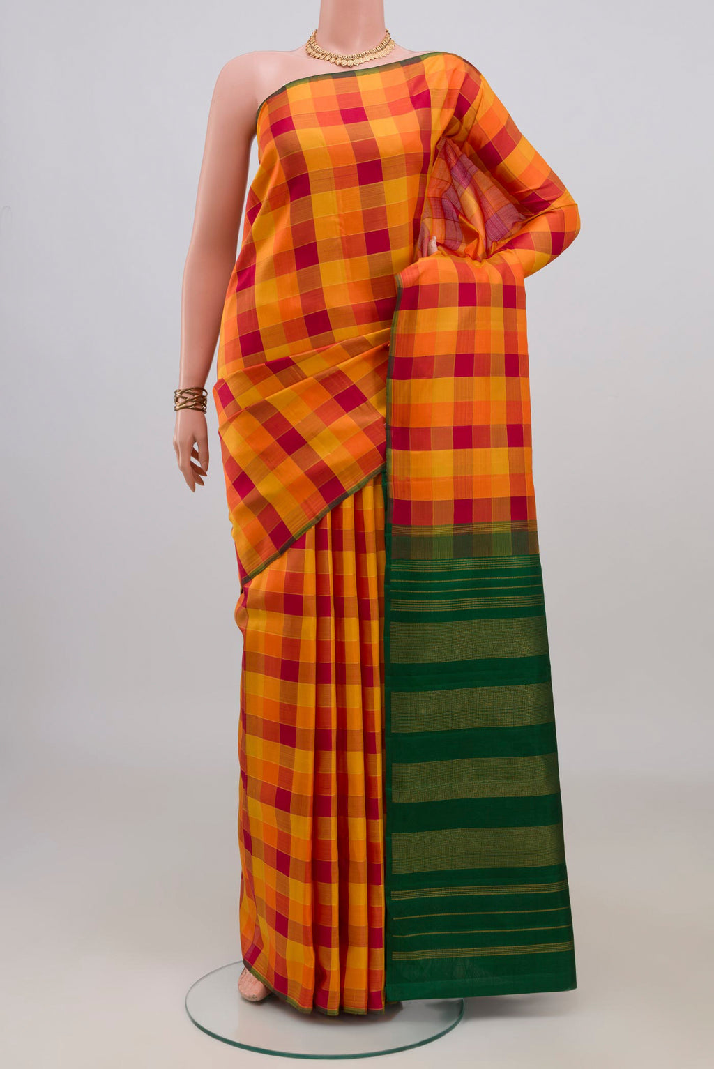 Pure Silk Pure Zari Multi Color Kanchipuram Saree with Checked design on the body and Without Border.  displayed on a mannequin