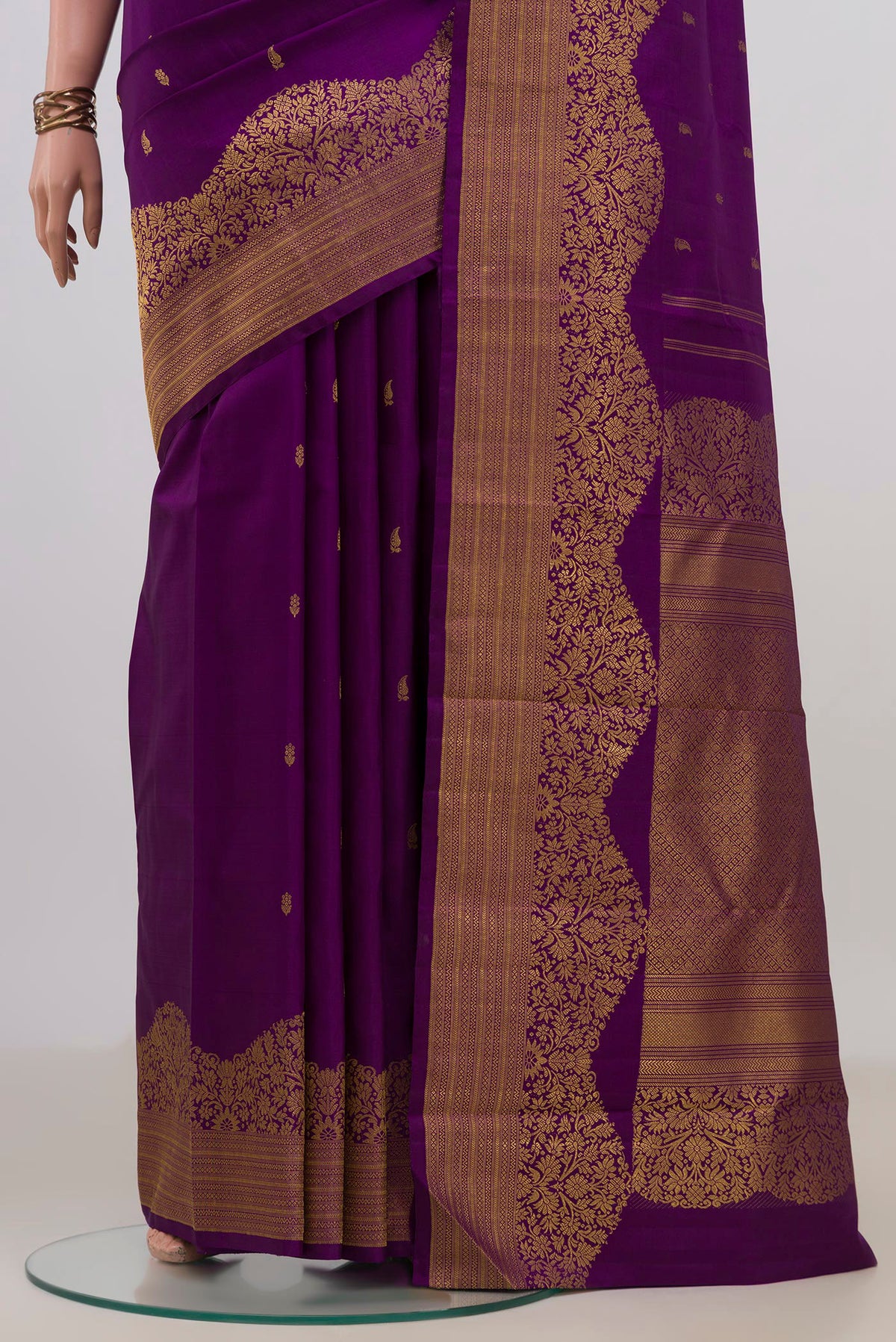 Pleats and pallu of Pure Silk Purple Kanjivaram Saree with Zari Butta on the body and Fancy Border. 