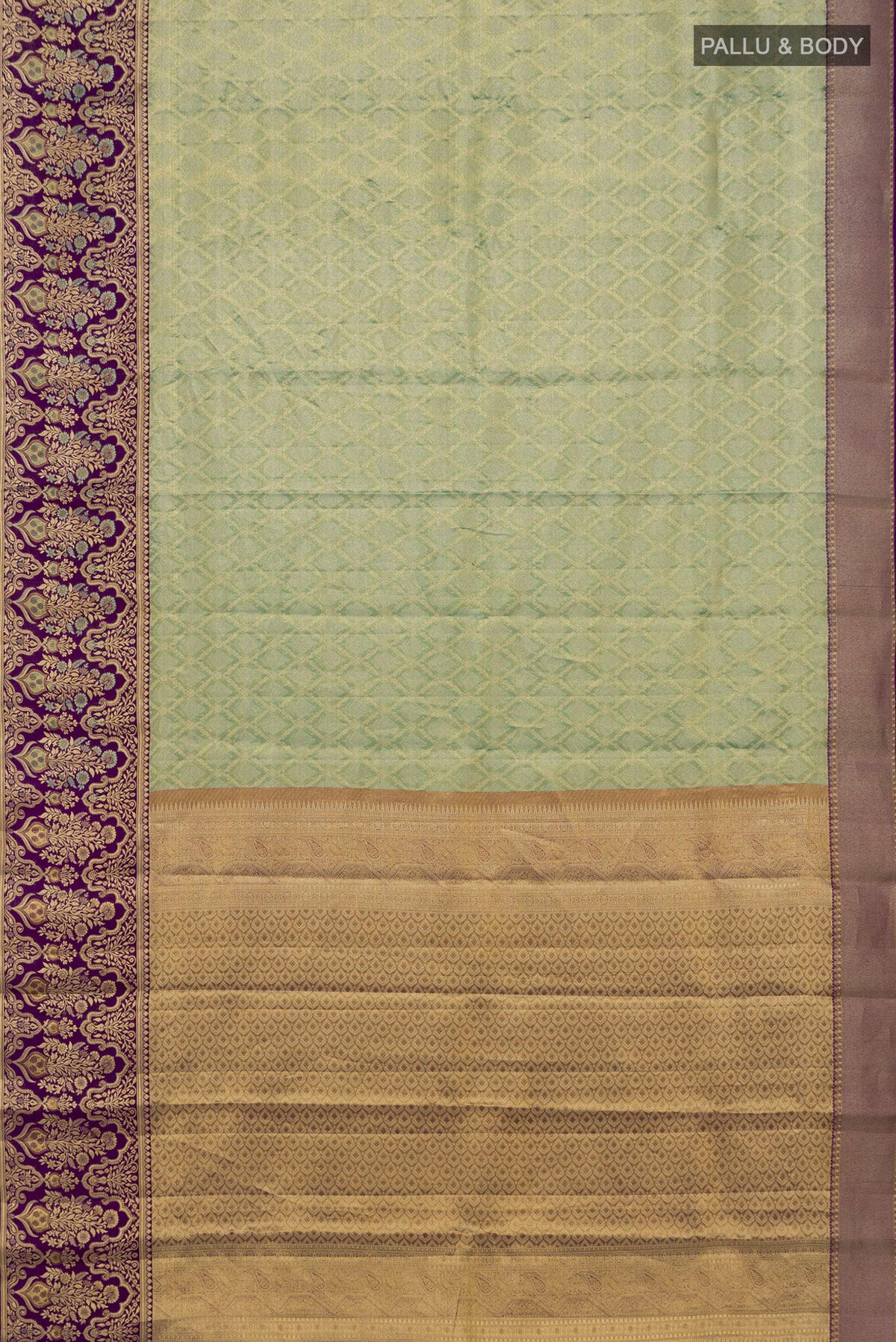 Flat view of Green Dual Tone Kanjivaram Saree with Zari Brocade on the body and Fancy Border. 
