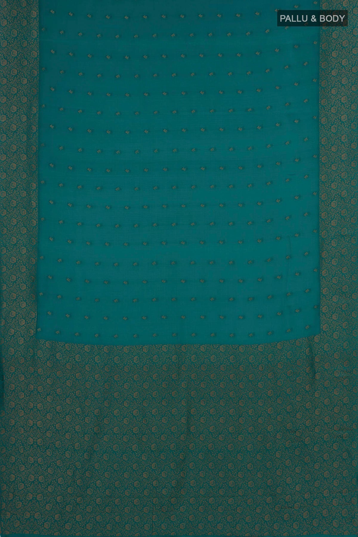 Flat view of Teal Mysore Crepe Saree with Zari Butta on the body and Fancy Border. 