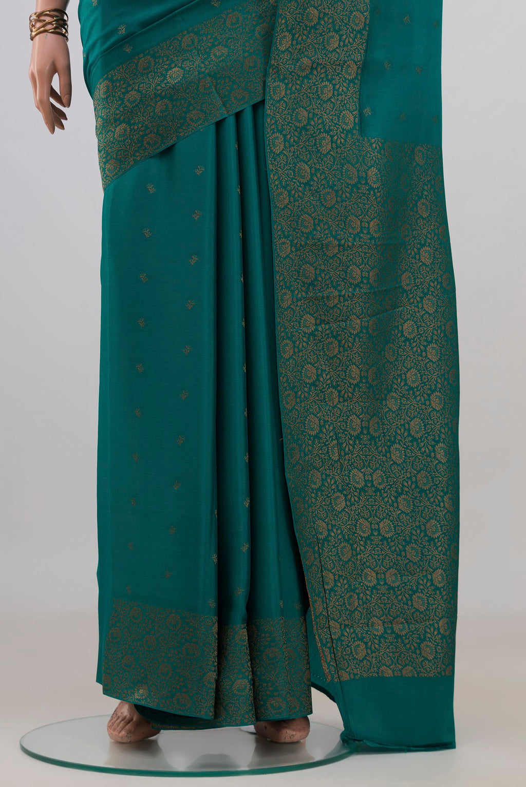 Pleats and pallu of Teal Mysore Crepe Saree with Zari Butta on the body and Fancy Border. 