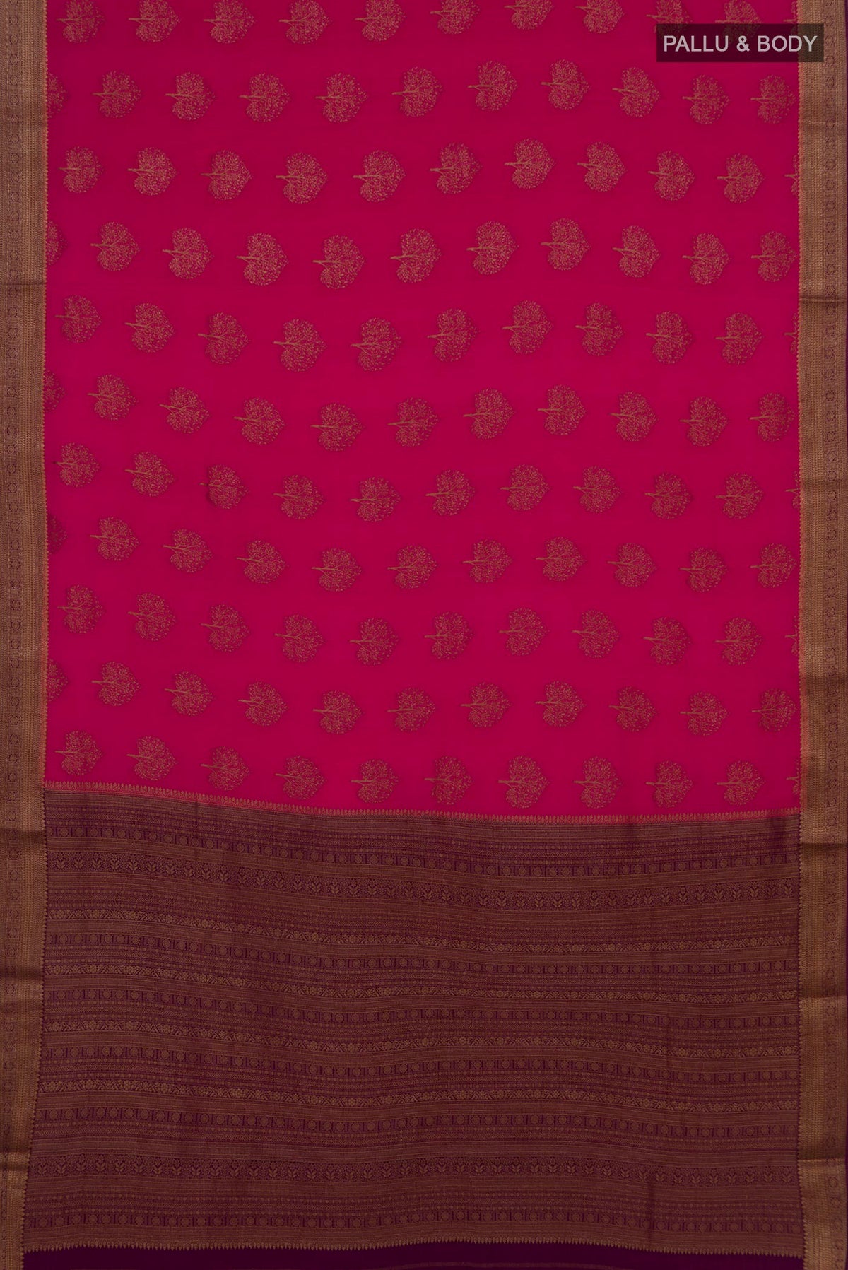 Flat view of Pink Crepe Saree with Zari Butta on the body and Zari Border. 