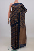 Navy Blue Mysore Crepe Saree with Zari Brocade on the body and Zari Border.  displayed on a mannequin