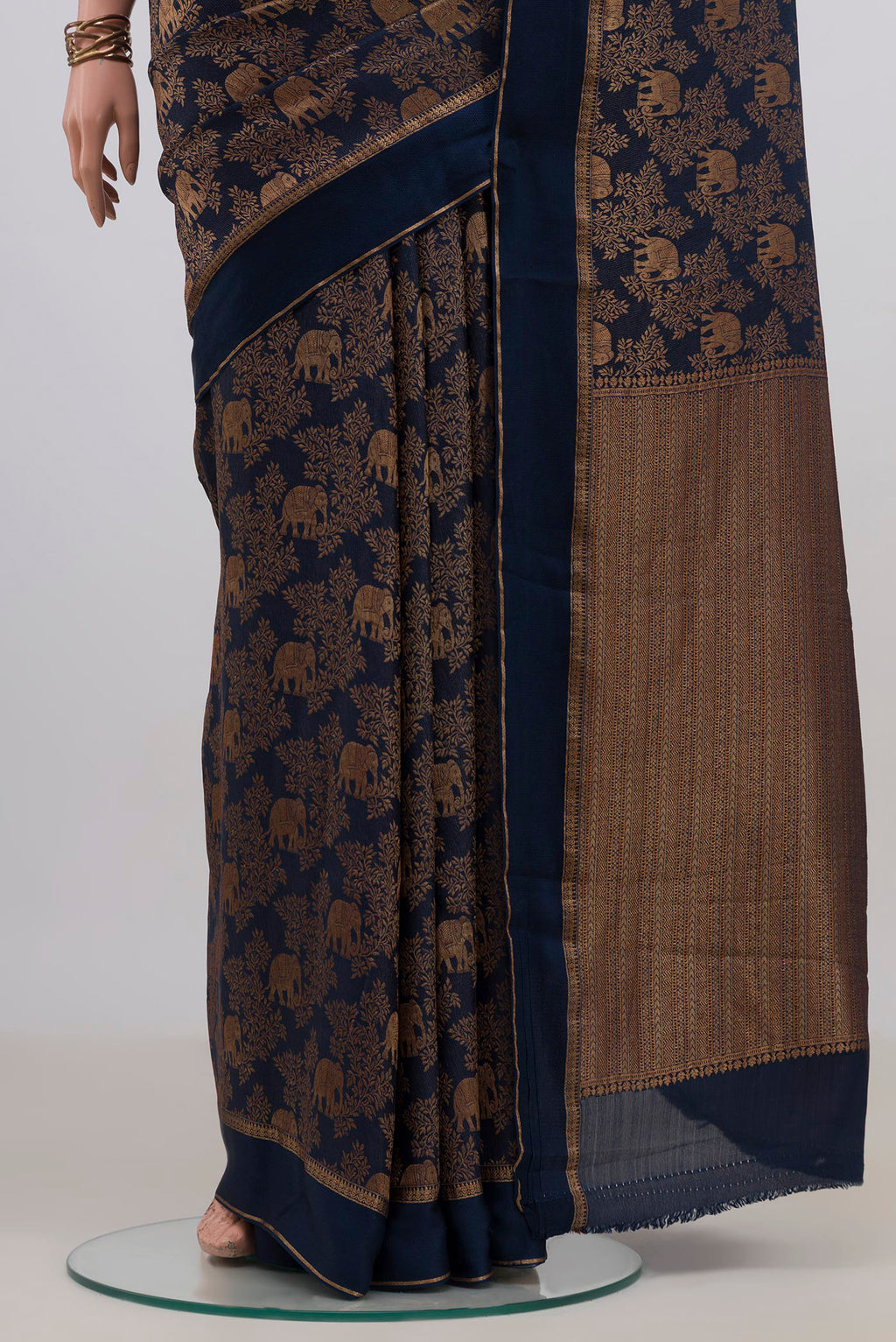 Pleats and pallu of Navy Blue Mysore Crepe Saree with Zari Brocade on the body and Zari Border. 