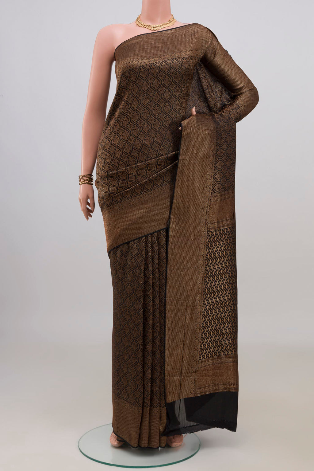 Black Mysore Crepe Saree with Zari Brocade on the body and Zari Border.  displayed on a mannequin