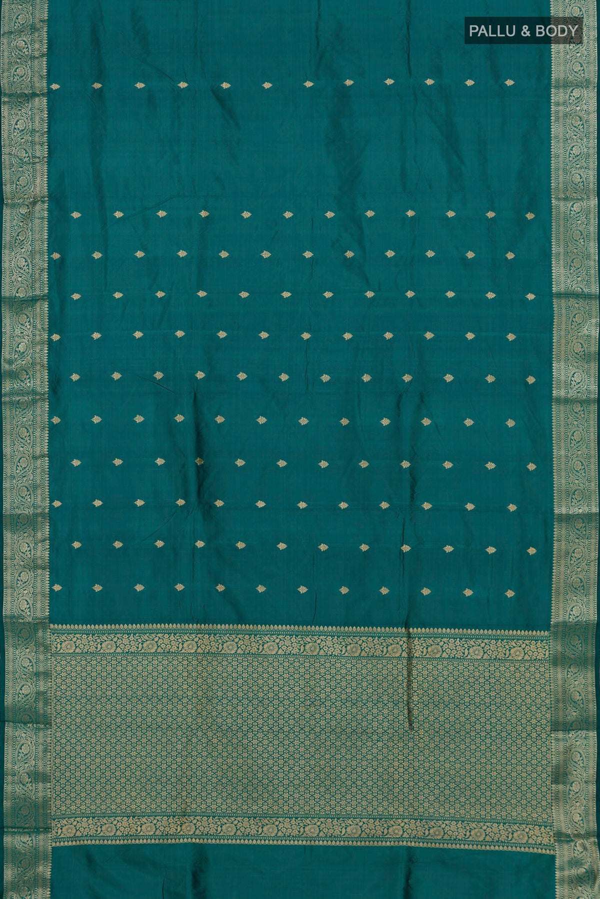 Flat view of Pure Silk Green Banarasi Katan Saree with Zari Butta on the body and Zari Border. 