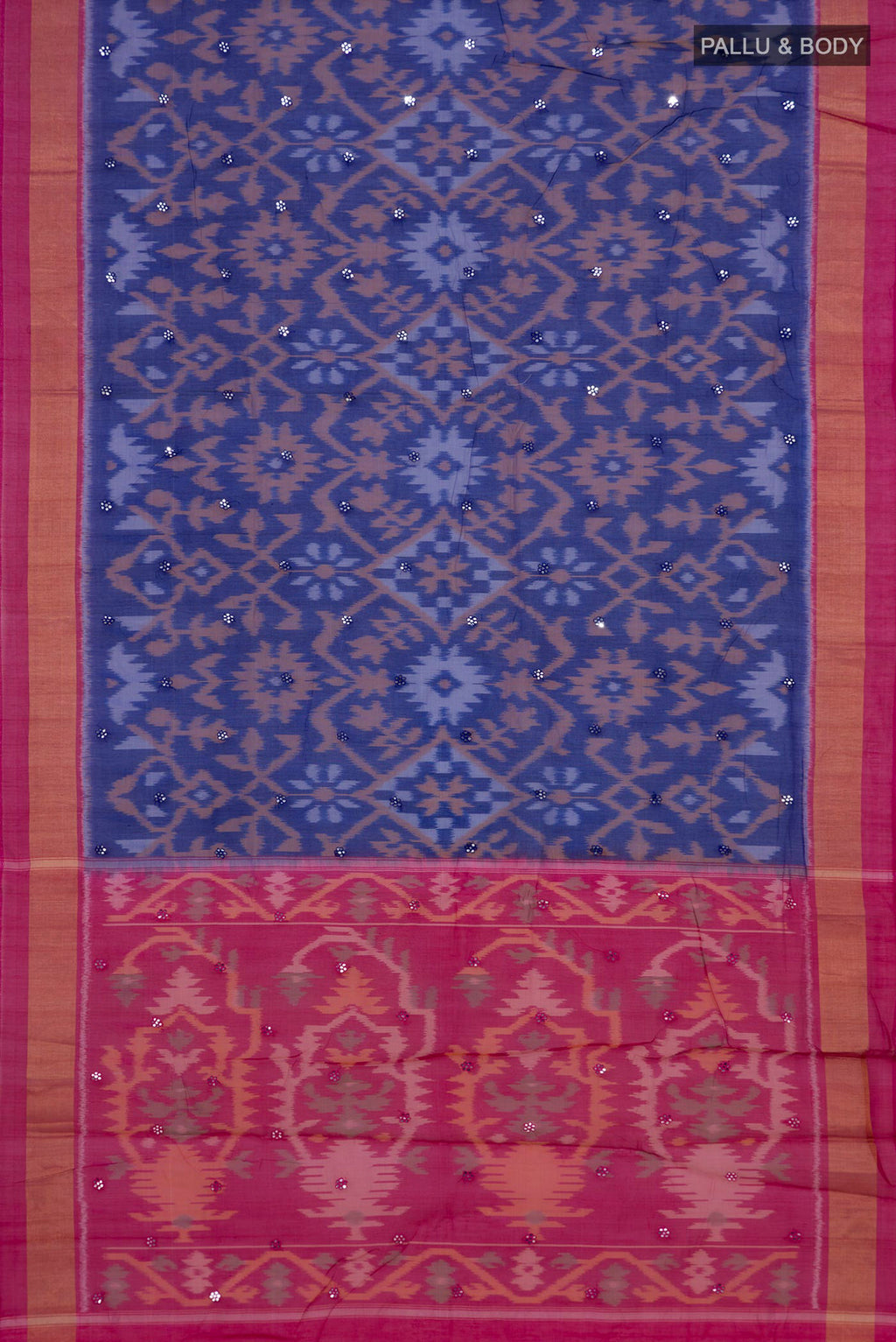 Flat view of Blue Silk Cotton Saree with Ikat Print on the body and Zari Border. 