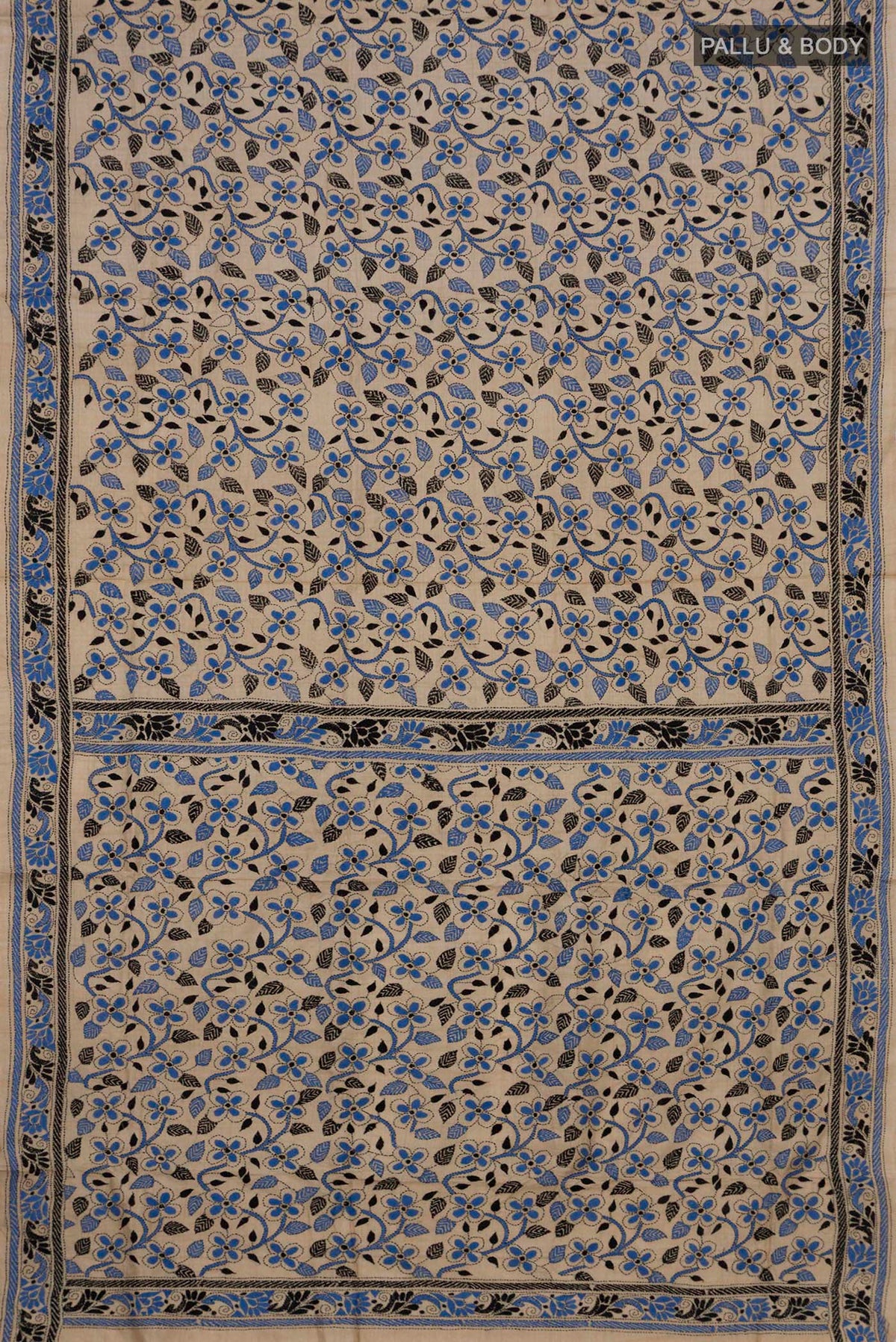 Flat view of Beige Tussar Saree with Kantha Work on the body and Thread Border. 
