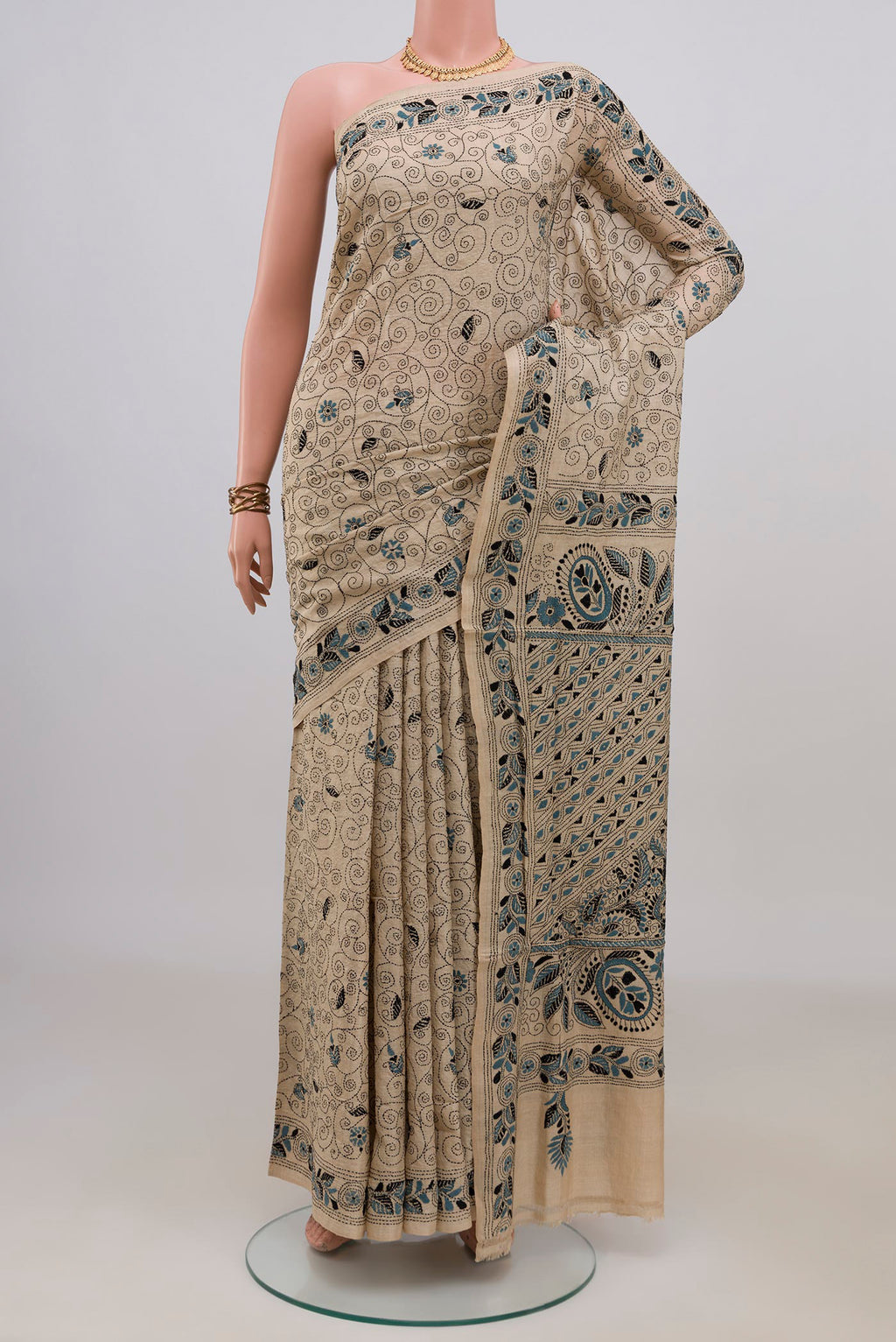 Pure Silk Cream Kantha Saree with Kantha Work on the body and Thread Border.  displayed on a mannequin