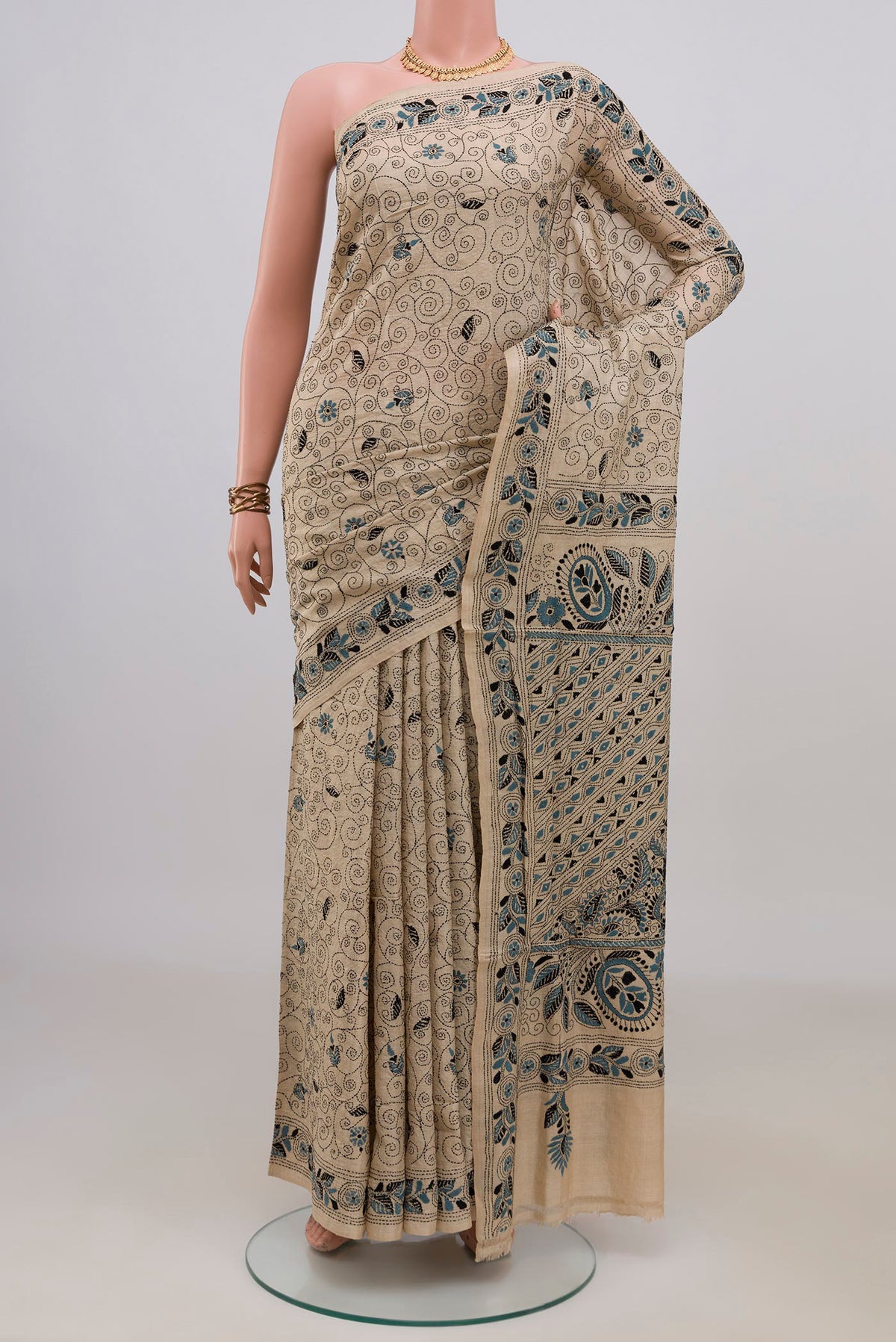Pure Silk Cream Kantha Saree with Kantha Work on the body and Thread Border.  displayed on a mannequin