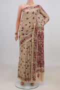 Beige Tussar Saree with Kantha Work on the body and Embroidery Border.  displayed on a mannequin