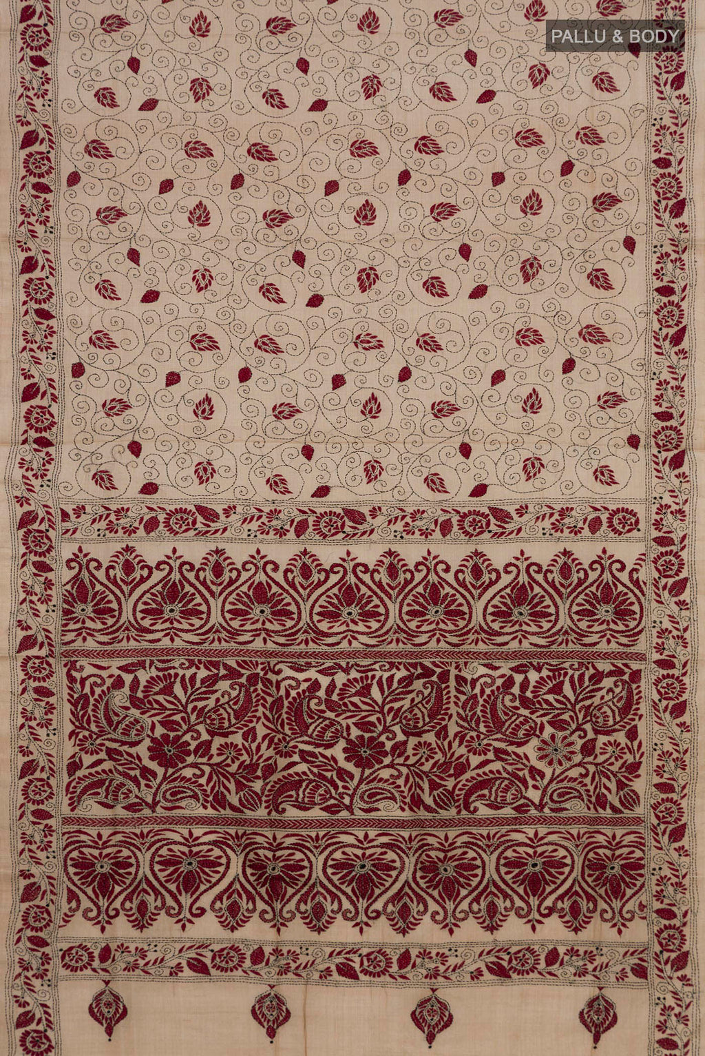 Flat view of Beige Tussar Saree with Kantha Work on the body and Embroidery Border. 
