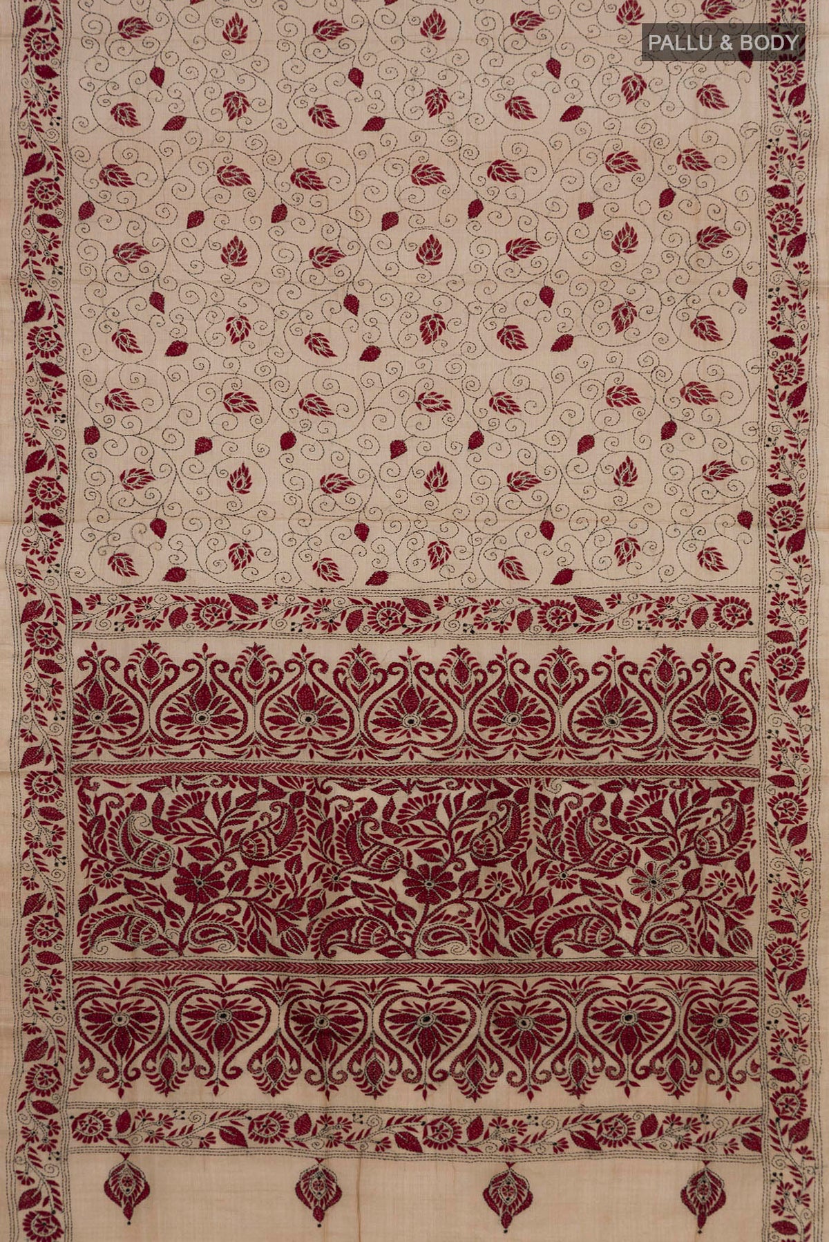 Flat view of Beige Tussar Saree with Kantha Work on the body and Embroidery Border. 