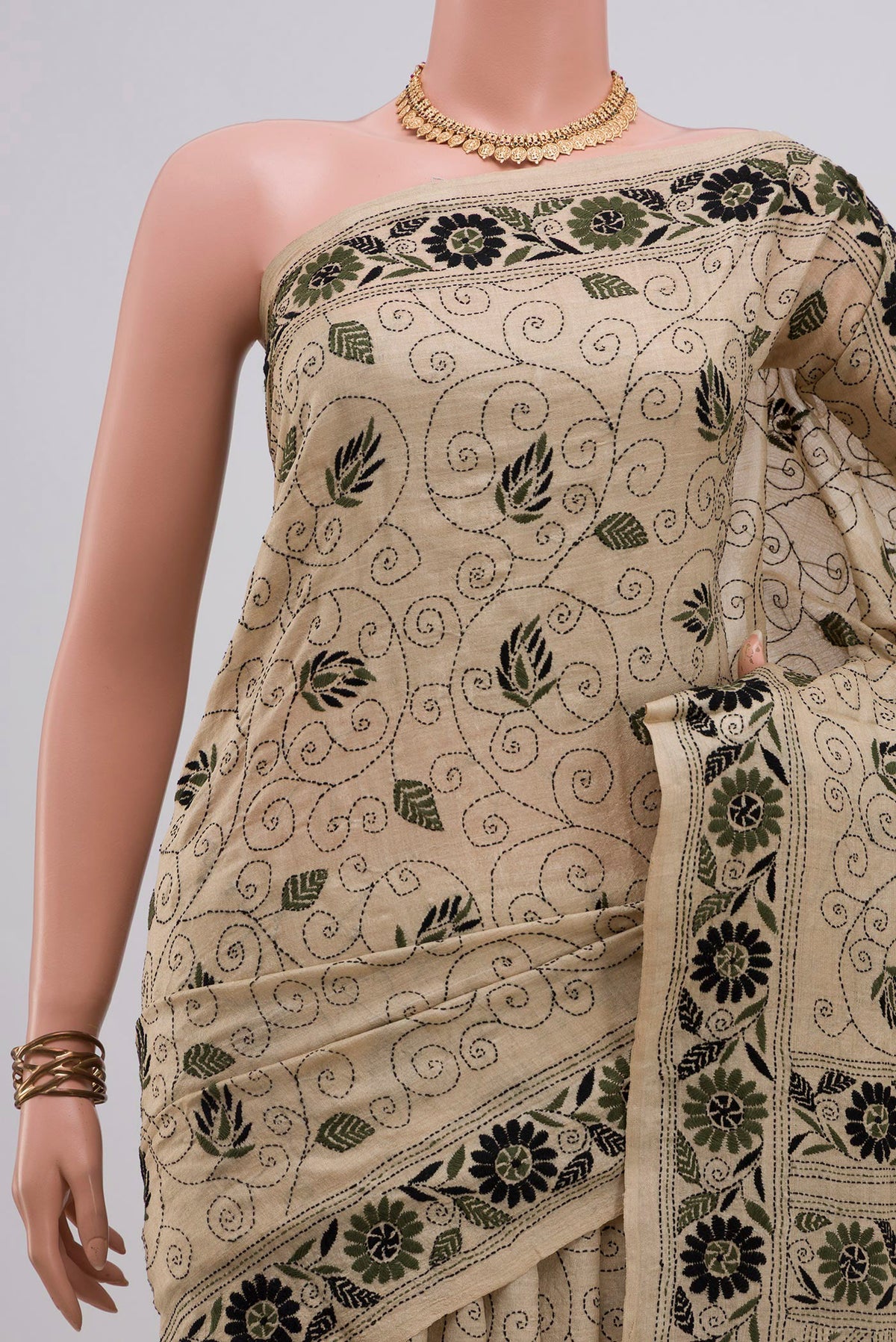 Border image of Pure Silk Cream Tussar Saree with Kantha Work on the body and Thread Border. 