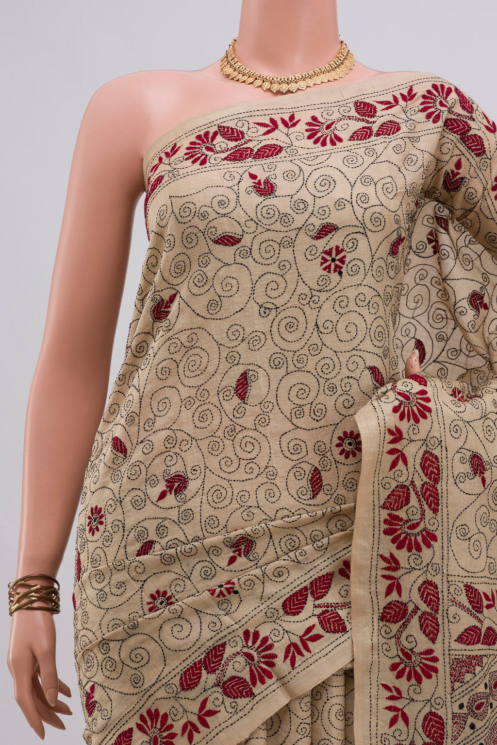 Border image of Pure Silk Cream Tussar Saree with Kantha Work on the body and Thread Border. 