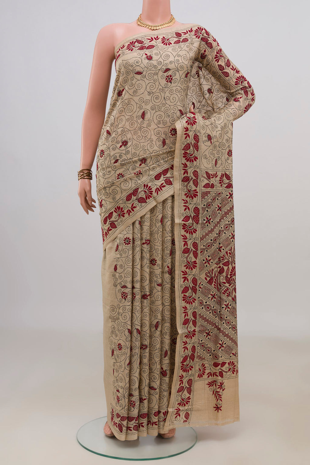 Pure Silk Cream Tussar Saree with Kantha Work on the body and Thread Border.  displayed on a mannequin
