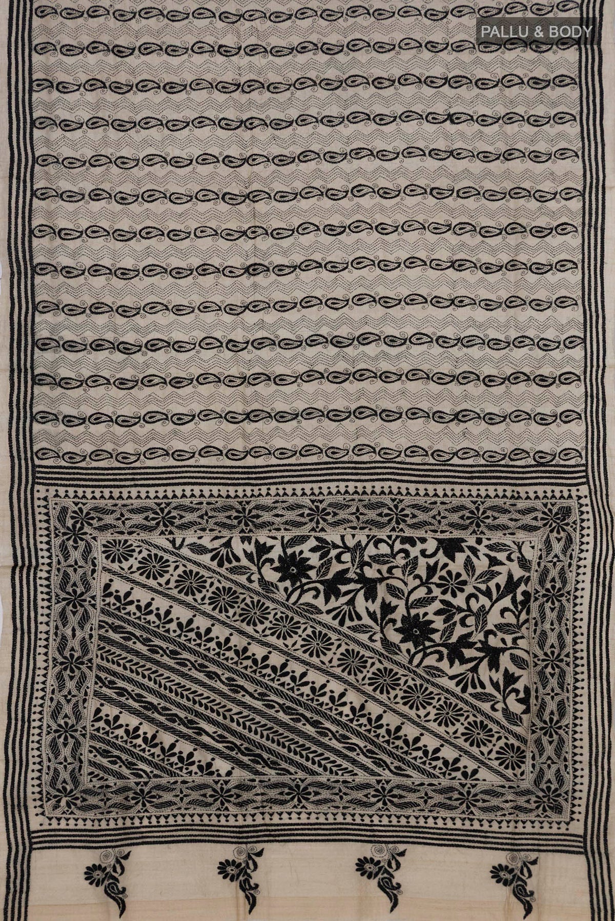 Flat view of Cream Tussar Saree with Kantha Work on the body and Thread Border. 