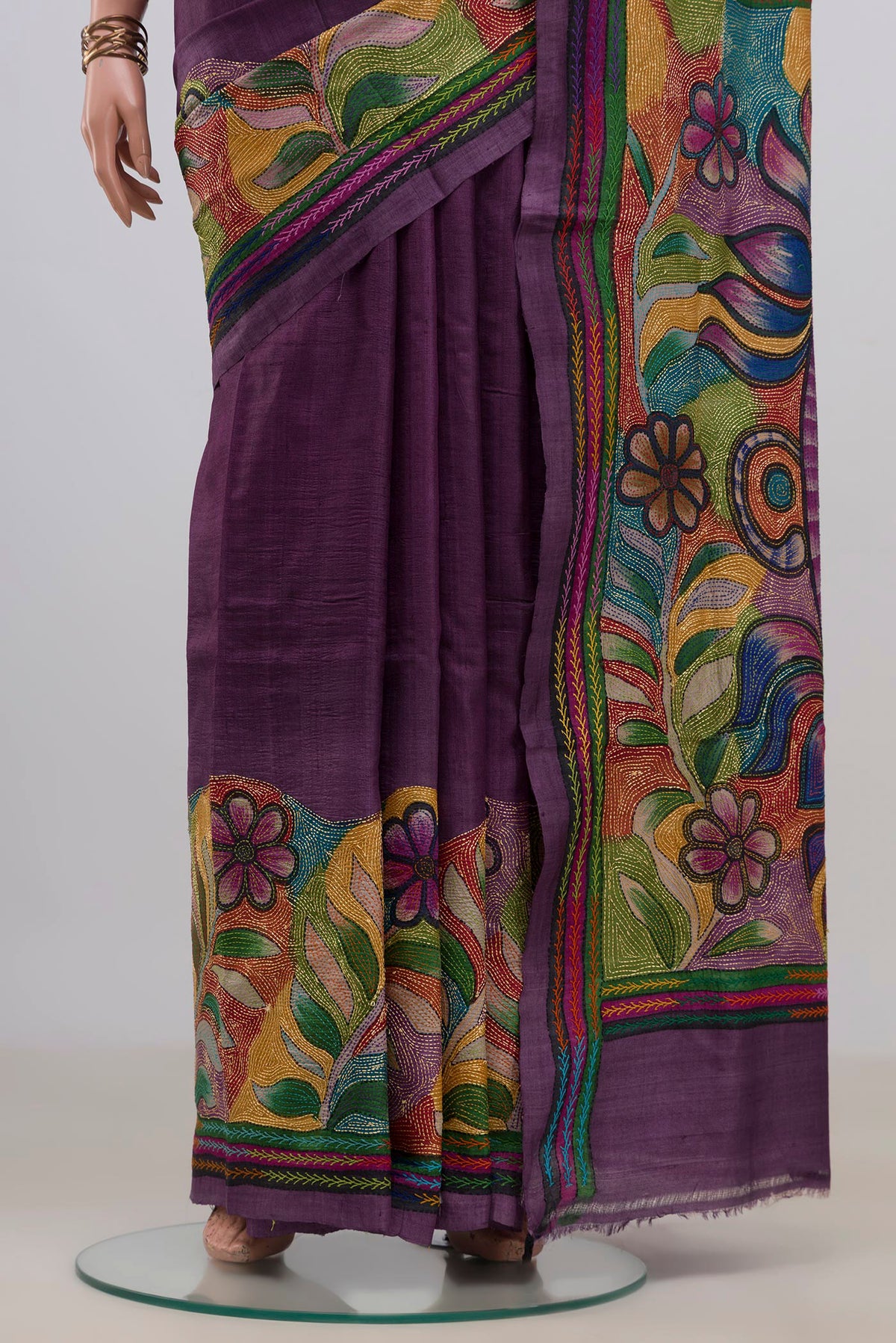 Pleats and pallu of Pure Silk Purple Tussar Saree with Kantha Work on the body and Thread Border. 
