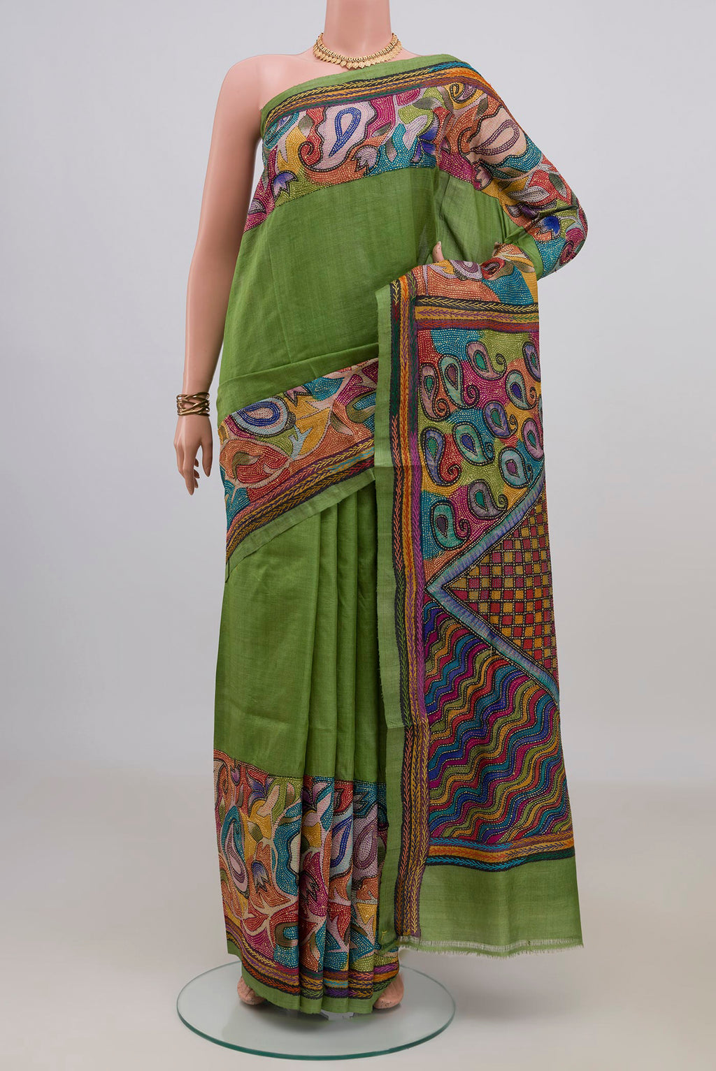 Green Tussar Saree with Kantha Work on the body and Thread Border.  displayed on a mannequin