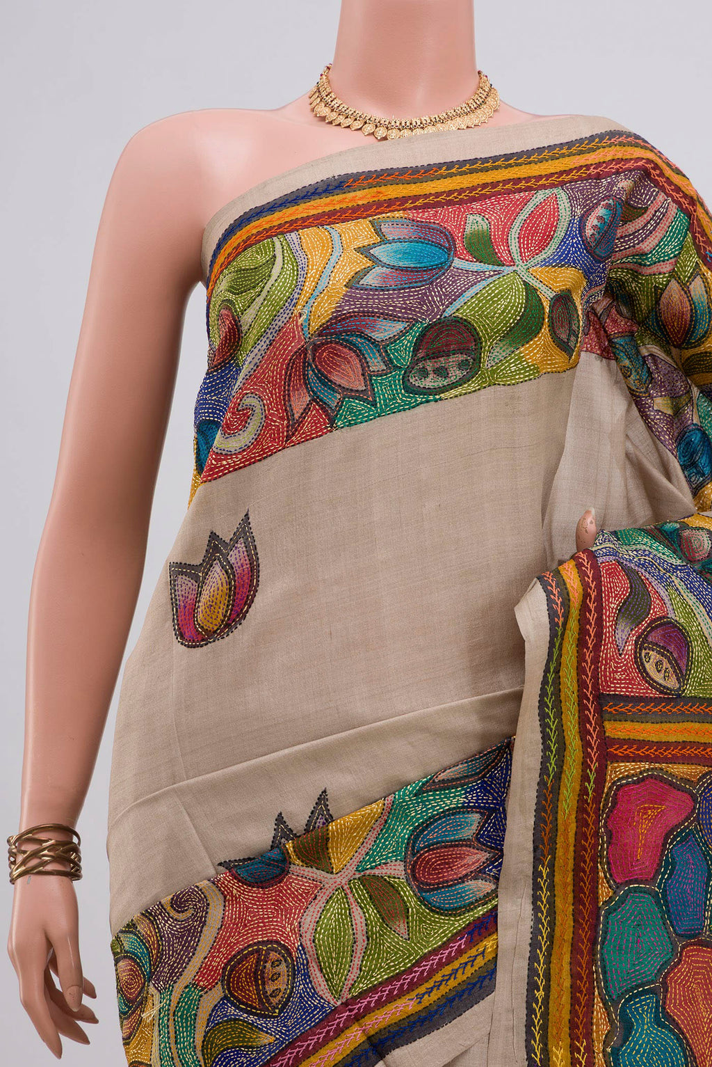 Border image of Pure Silk Cream Tussar Saree with Kantha Work on the body and Thread Border. 
