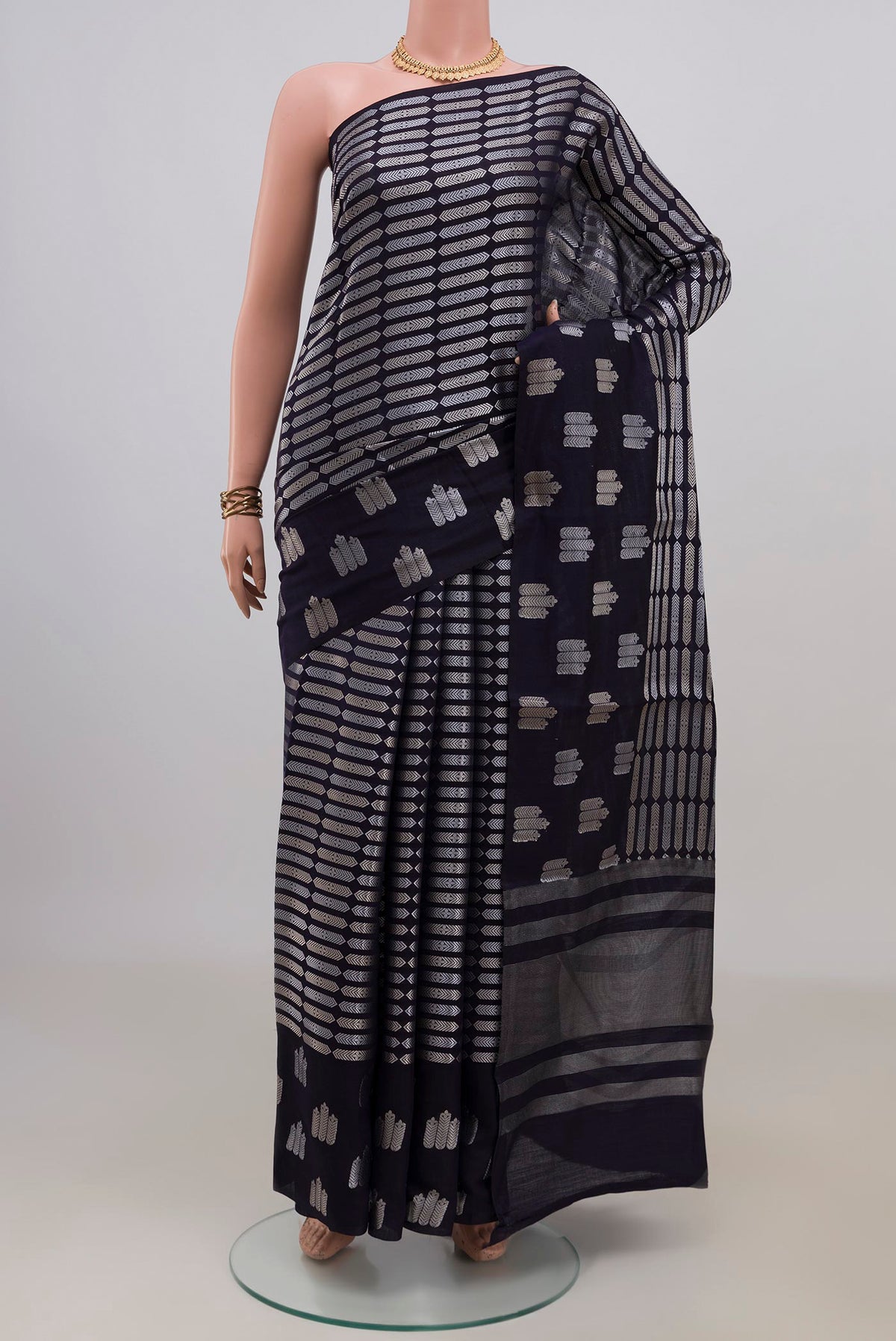 Pure Silk Navy Blue Banarasi Raw Saree with Zari Brocade on the body and Fancy Border.  displayed on a mannequin