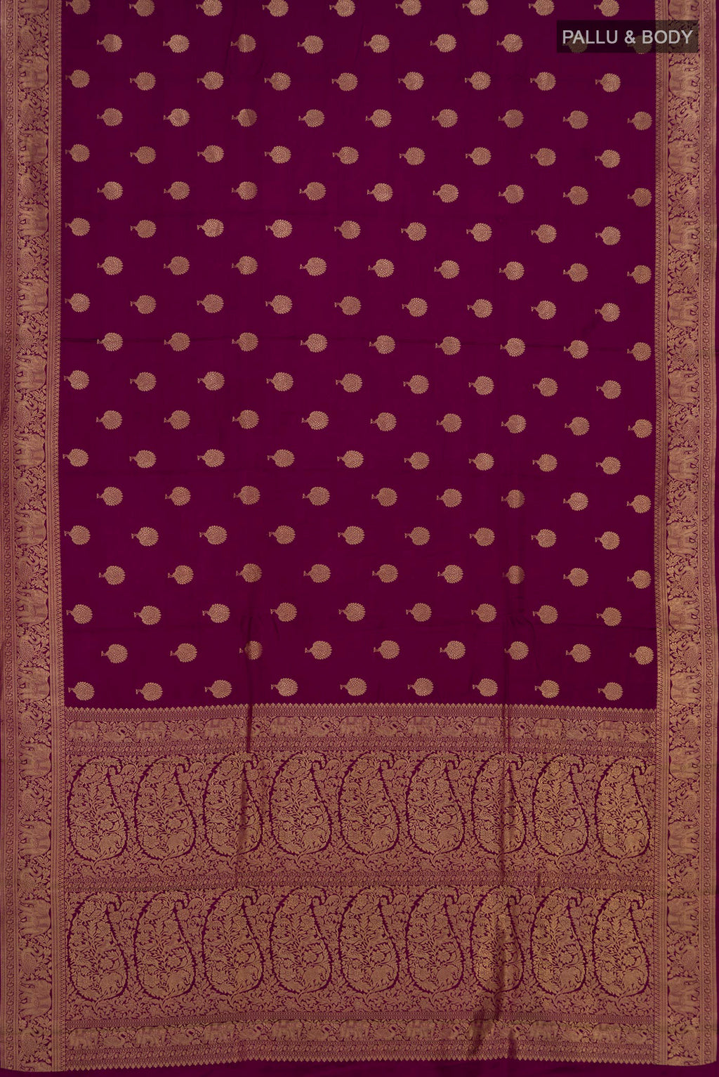 Flat view of Magenta Banarasi Saree with Zari Butta on the body and Fancy Border. 