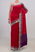 Pure Silk Red Raw Saree with Plain Body and Zari Border.  displayed on a mannequin