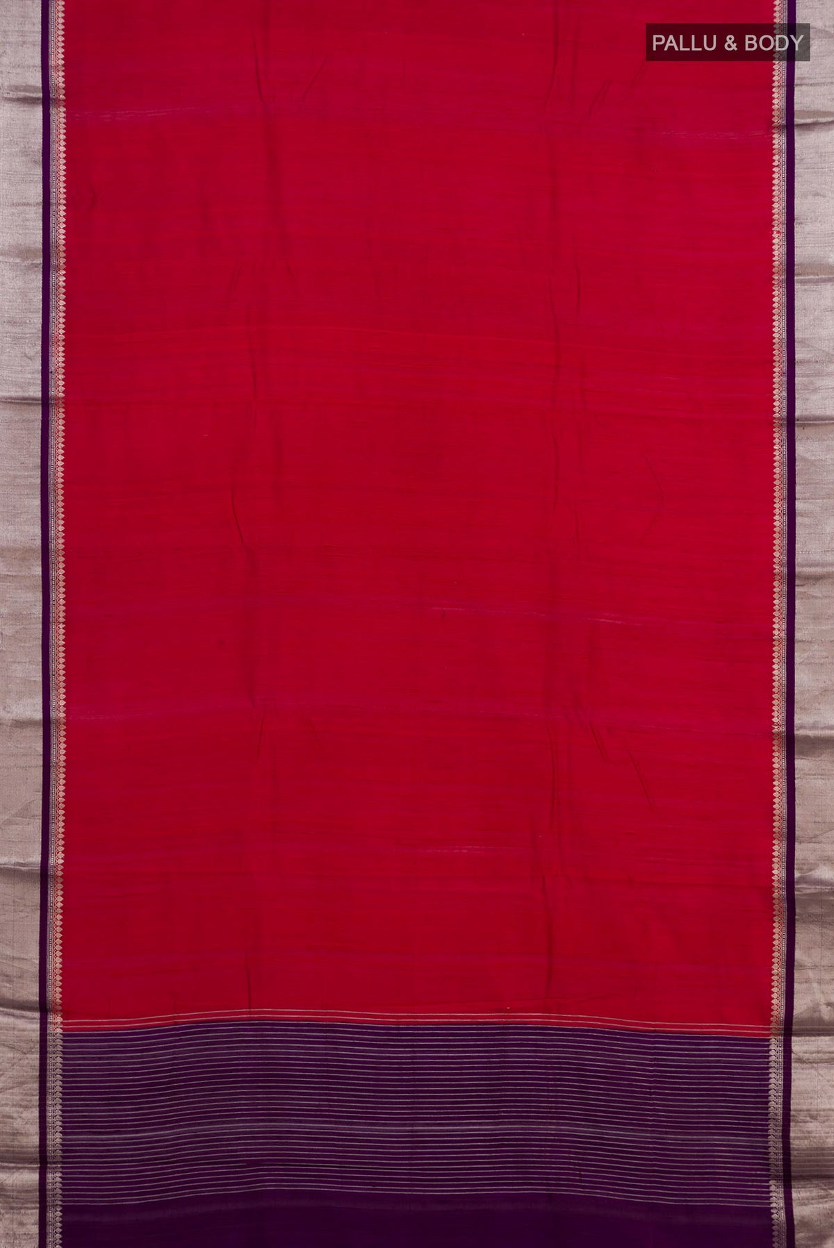 Flat view of Pure Silk Red Raw Saree with Plain Body and Zari Border. 