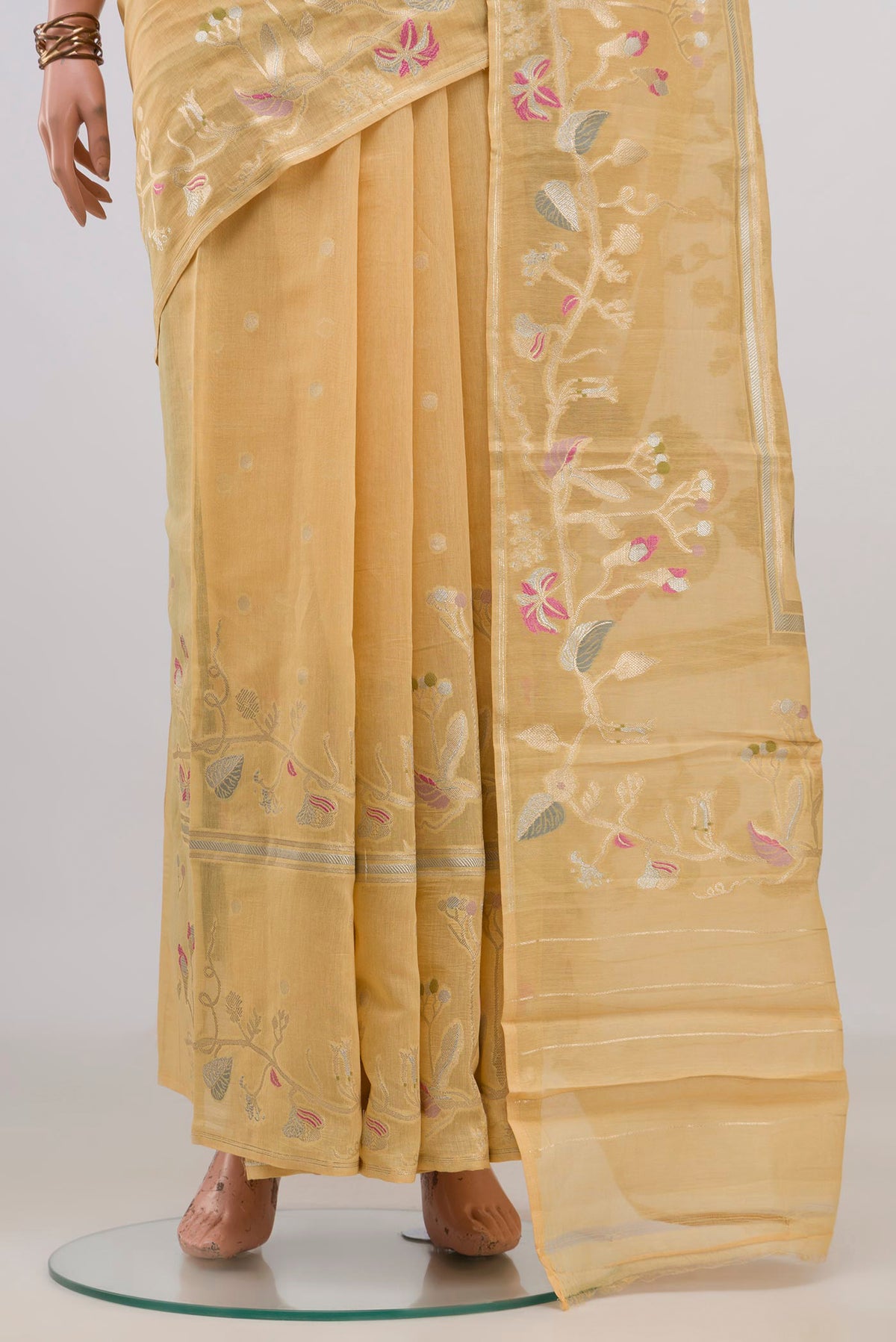 Pleats and pallu of Pure Silk Yellow Tussar Saree with Zari Butta on the body and Fancy Border. 