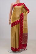 Pure Silk Yellow Banarasi Raw Saree with Zari Brocade on the body and Fancy Border.  displayed on a mannequin