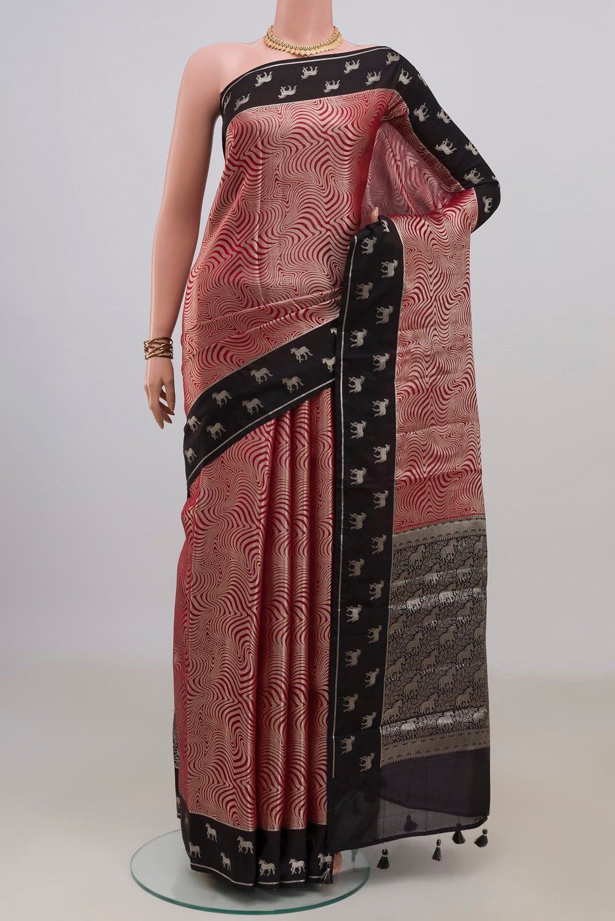 Pure Silk Red Banarasi Raw Saree with Zari Brocade on the body and Fancy Border.  displayed on a mannequin