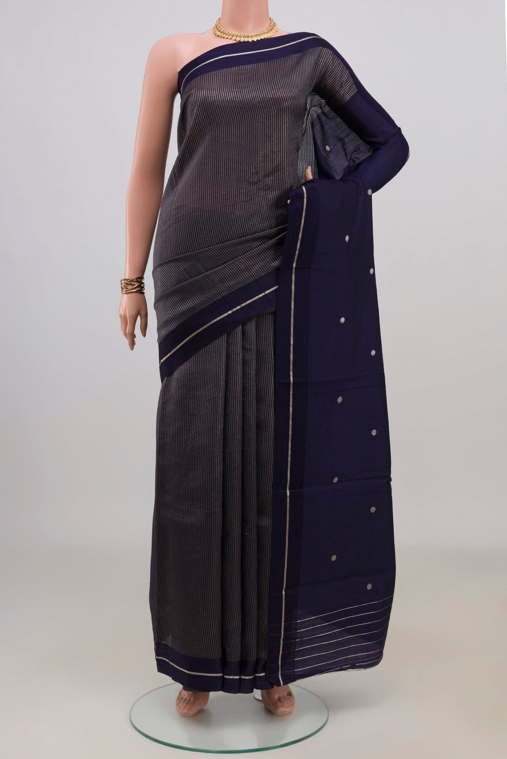 Pure Silk Navy Blue Banarasi Katan Saree with Stripes on the body and Thin Zari Line.  displayed on a mannequin