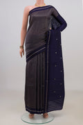 Pure Silk Navy Blue Banarasi Katan Saree with Stripes on the body and Thin Zari Line.  displayed on a mannequin