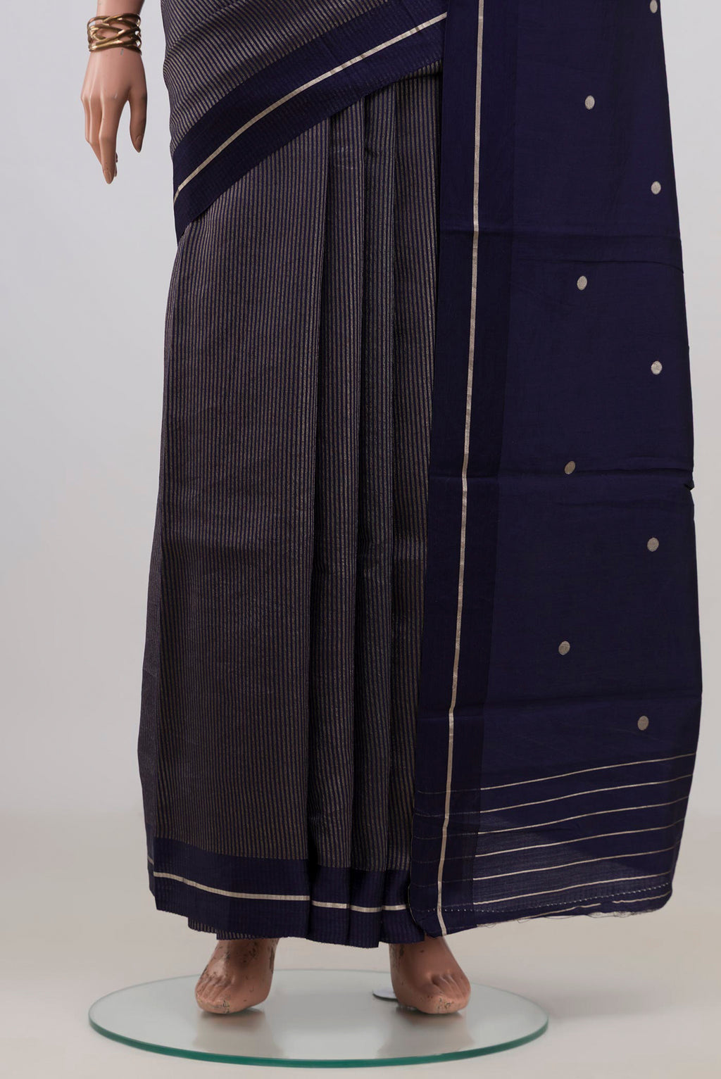 Pleats and pallu of Pure Silk Navy Blue Banarasi Katan Saree with Stripes on the body and Thin Zari Line. 