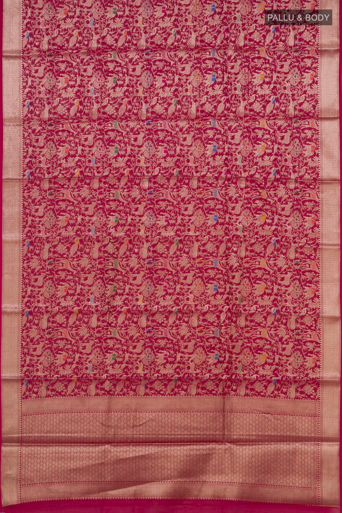 Flat view of Pure Silk Dark Pink Banarasi Raw Saree with Zari Brocade on the body and Zari Border. 