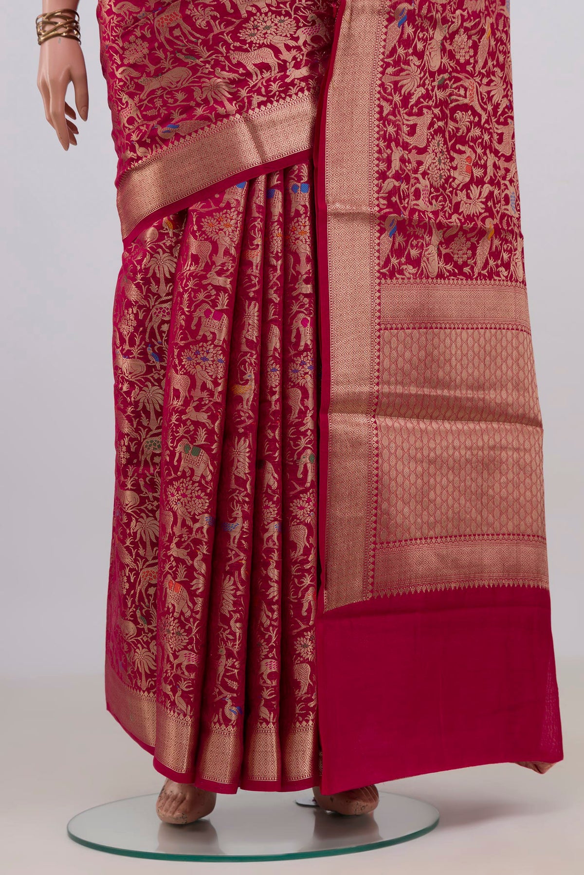 Pleats and pallu of Pure Silk Dark Pink Banarasi Raw Saree with Zari Brocade on the body and Zari Border. 