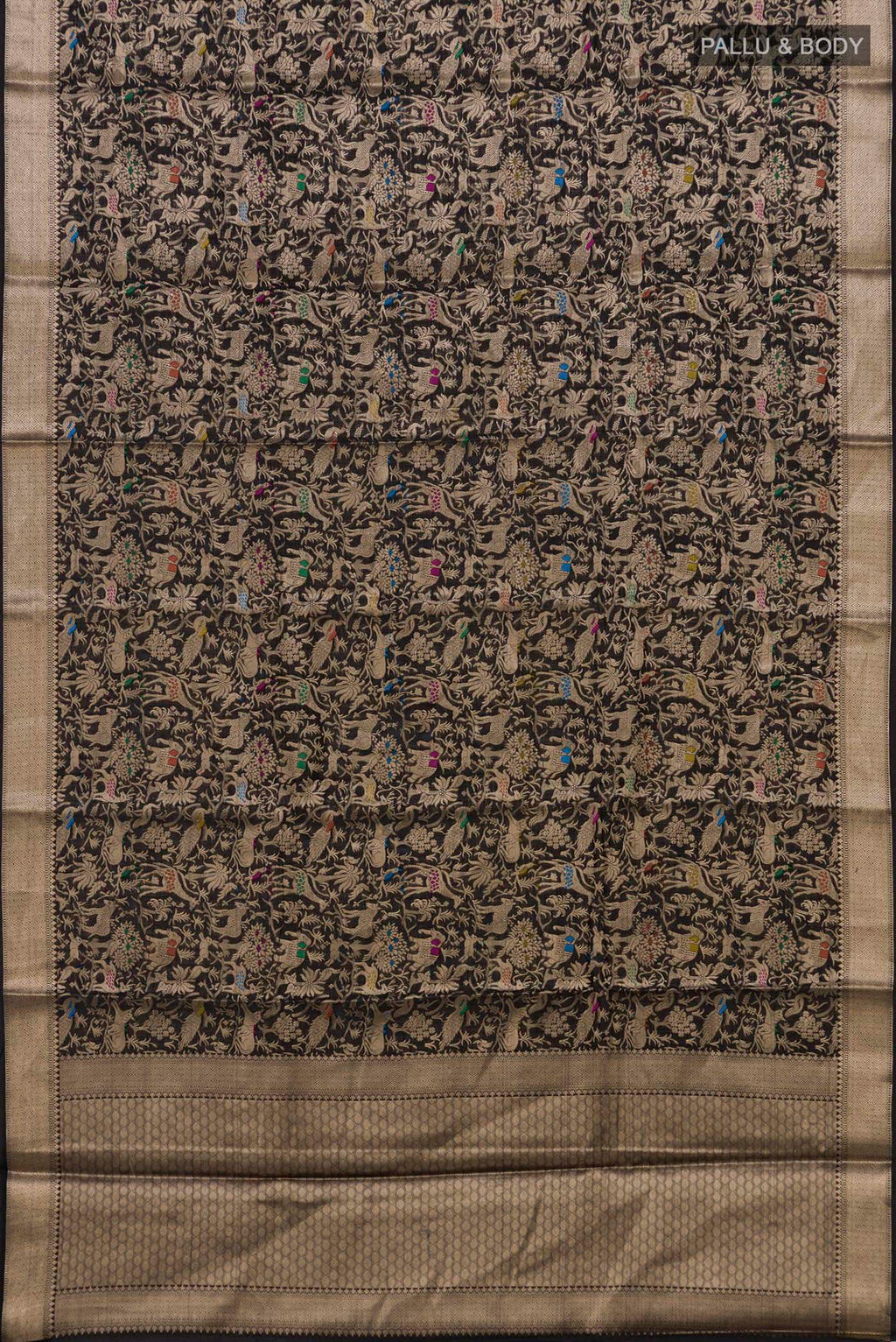 Flat view of Pure Silk Black Raw Saree with Zari Brocade on the body and Zari Border. 