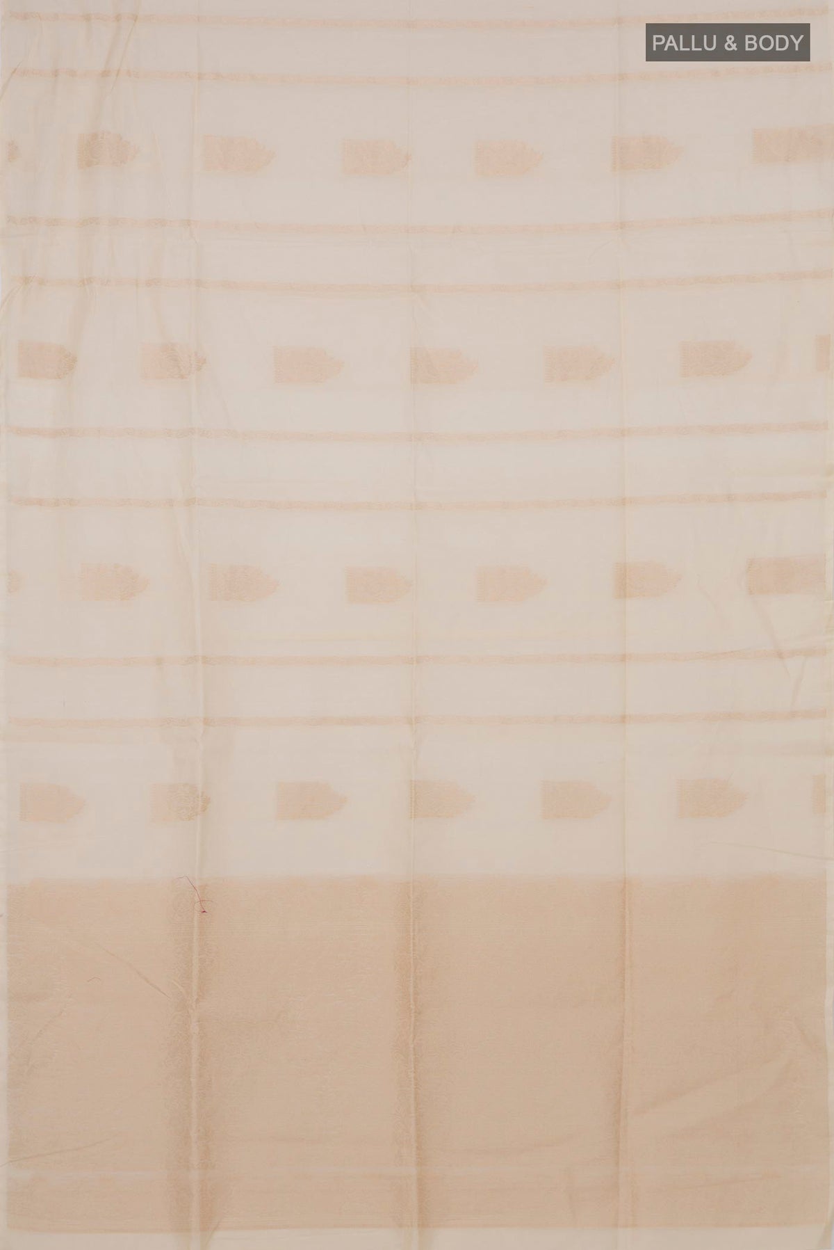 Flat view of Cream Silk Cotton Saree with Zari Butta on the body and Without Border. 